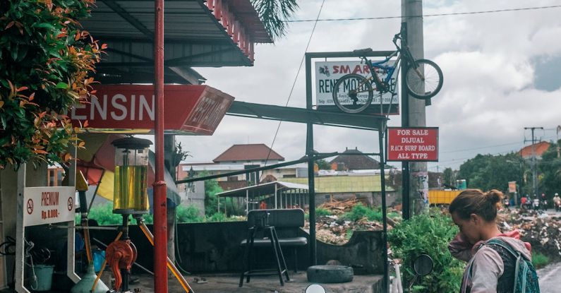 Local Tours - Woman with motorbike at gas station