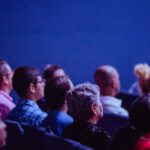 Conferences - People Sitting on Gang Chairs