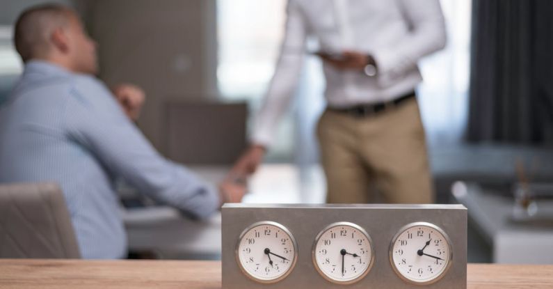 Time Zones - Gray and White Clock on Wooden Table