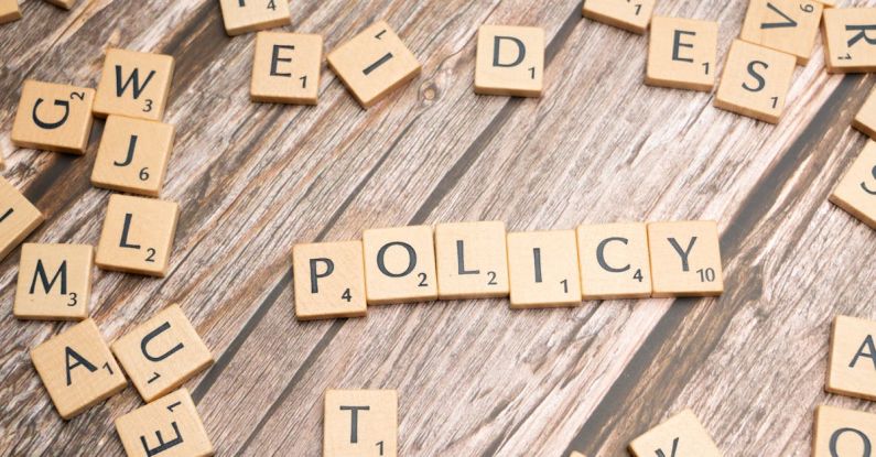 Protocol - The word policy spelled out in scrabble letters