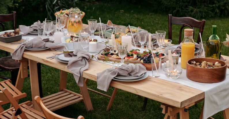 After-Dinner Drinks - Food on Brown Wooden Table With Chairs and Plates