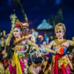 Traditions - Two Women Dancing While Wearing Dresses at Night Time