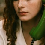 Patience - Redheaded Woman Talking on the Phone